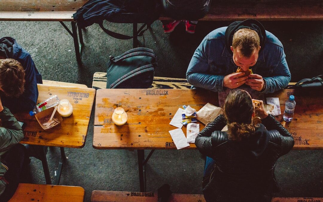 Syrian refugee family sharing a meal in a Danish apartment